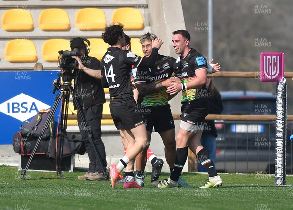 260322 - Zebre Parma v Scarlets - United Rugby Championship - Giovanni D'Onofrio of Zebre (14) celebrates with team mates