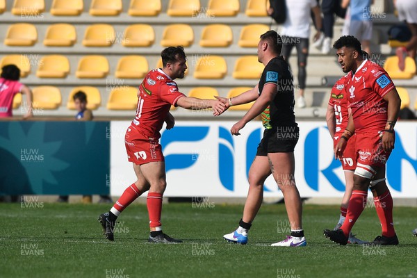 260322 - Zebre Parma v Scarlets - United Rugby Championship - The players shake hands at the end of the match