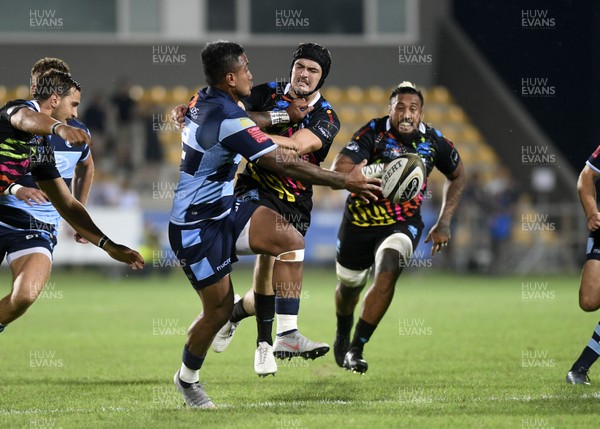 150918 - Zebre v Cardiff Blues - Guinness PRO14 -  Rey Lee-Lo of Cardff Blues offloads out of the tackle of Carlo Canna of Zebre