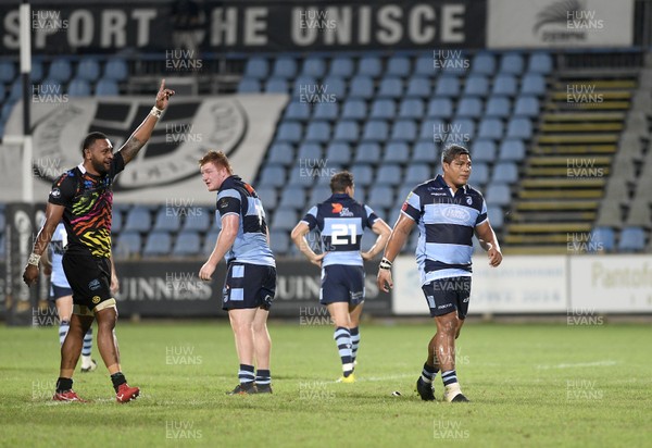 150918 - Zebre v Cardiff Blues - Guinness PRO14 -  A dejected Rhys Carre and Nick Williams of Cardiff Blues while Zebre celebrate at the end of the match