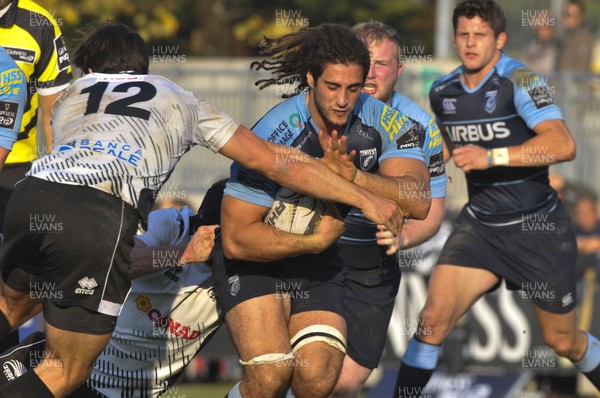 301015 - Zebre Rugby v Cardiff Blues - Guinness PRO12 - Josh Navidi tackled by Matteo Pratichetti