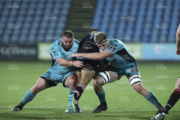 270221 - Zebre v Dragons - Guinness PRO14 - Pierre Bruno is tackled by Lloyd Fairbrother and Ben Carter