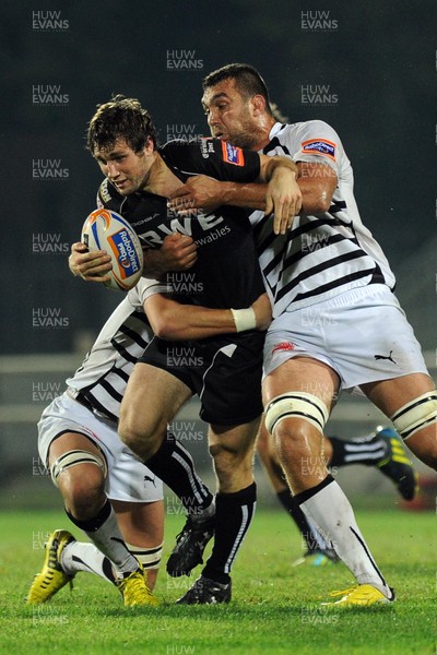 051012 Zebre v Ospreys - RaboDirect Pro12 - Ospreys' Andrew Bishop is stopped in his tracks 