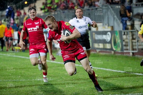090917 - Zebre Rugby Club v Scarlets - Guinness PRO14 -  Johnny McNicholl of Scarlets runs to score try
