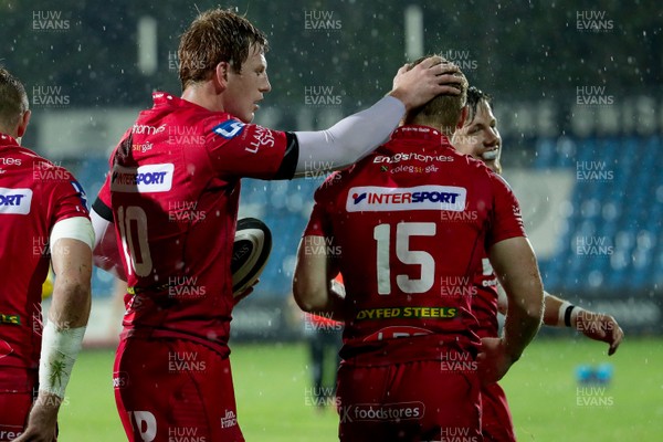090917 - Zebre Rugby Club v Scarlets - Guinness PRO14 -  Rhys Patchell of Scarlets celebrates the try scored by Johnny McNicholl