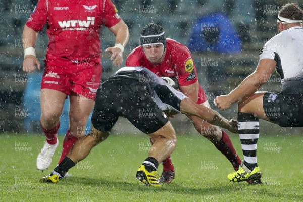 090917 - Zebre Rugby Club v Scarlets - Guinness PRO14 -  Ryan Elias of Scarlets takes on Johan Mwjer of Zebre